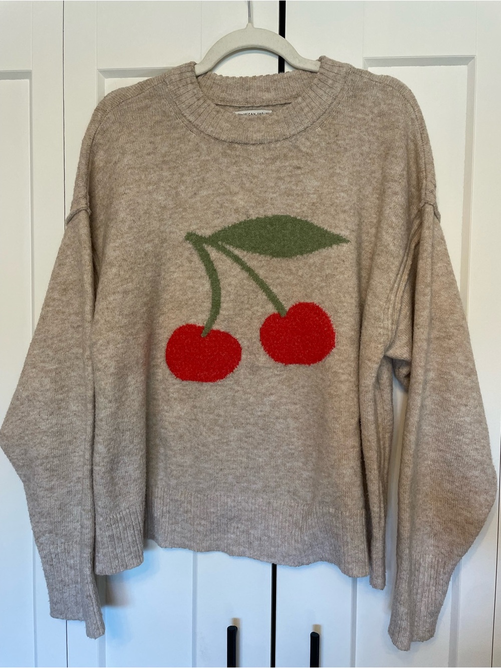 American Eagle Outfitters Cream Sweater with Red Cherry Graphic